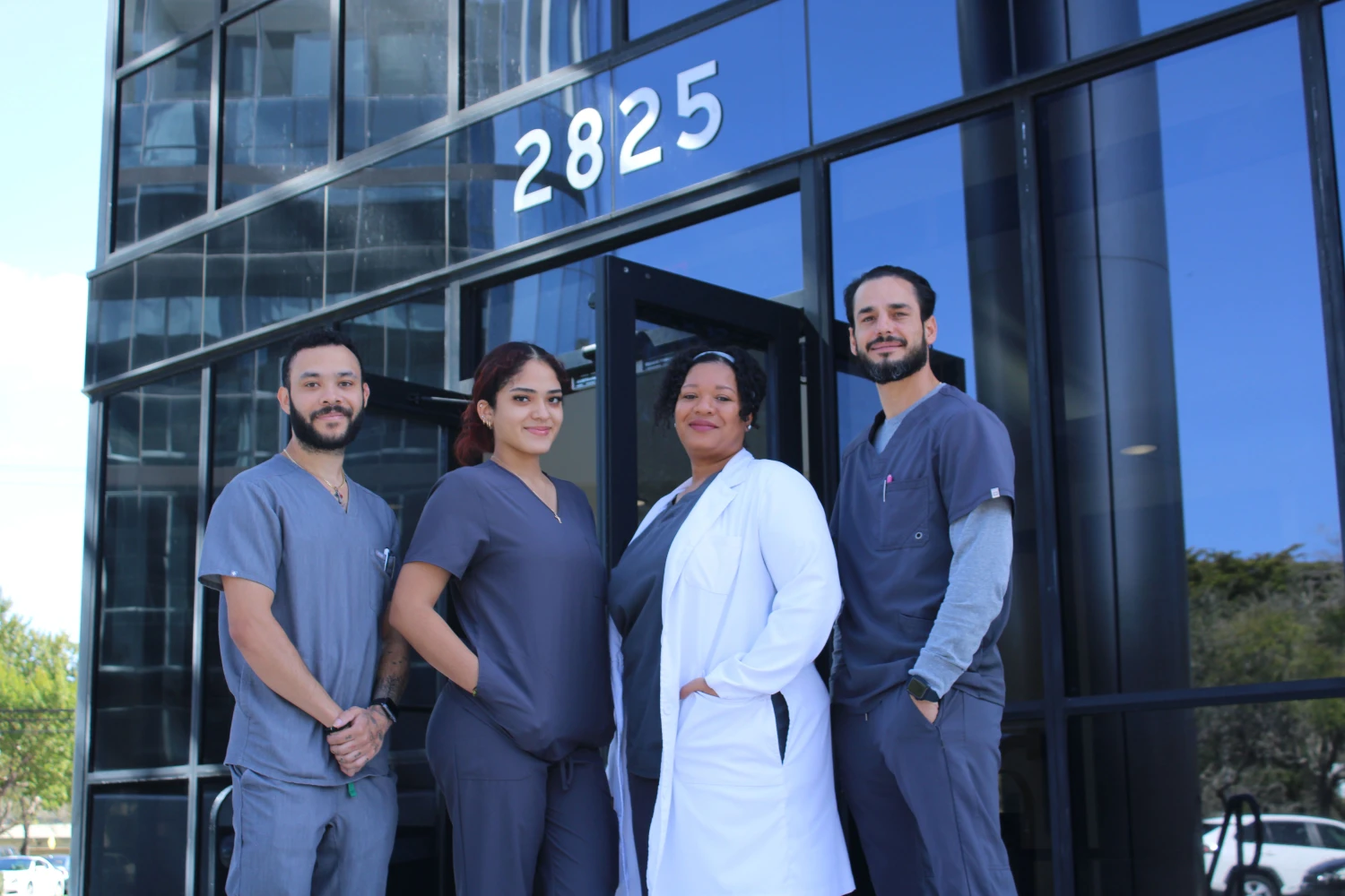 Coral Springs Chiropractic Office Staff Standing Outside the Clinic